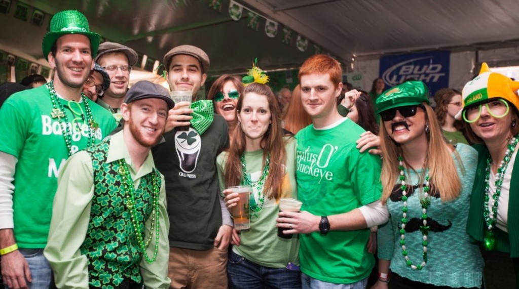 Saint Patricks day being celebrated by a group of people dressed in green