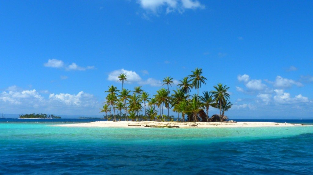 Small Island with palm trees, like a small heaven on Earth 