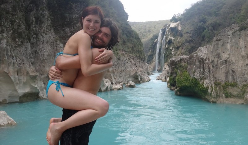 A couple hugging at Huasteca Potosina, a blue river in Mexico