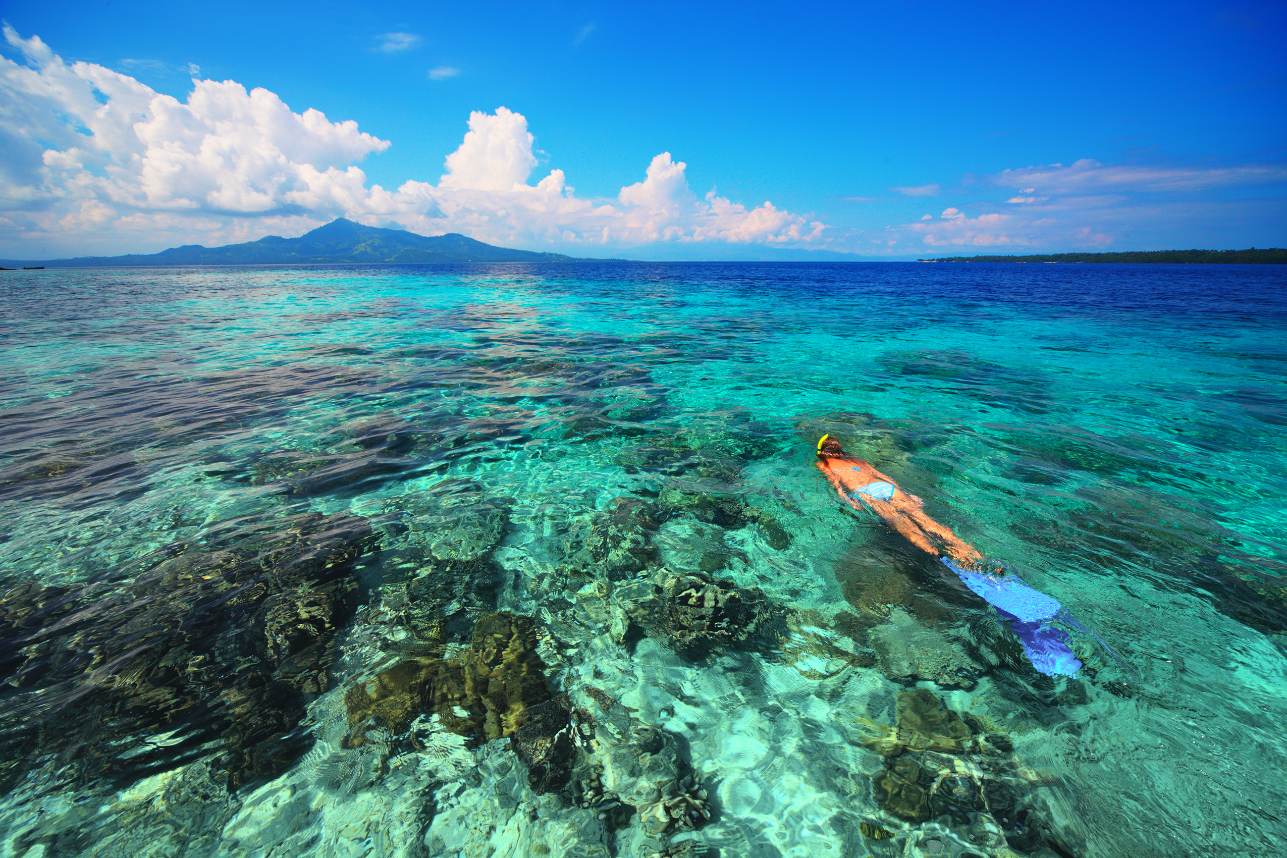 Woman snorkeling in Komodo National Park 