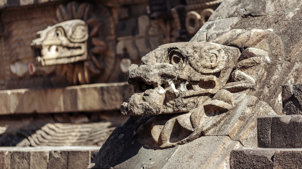 Carving details of Quetzalcoatl Pyramid at Teotihuacan Ruins