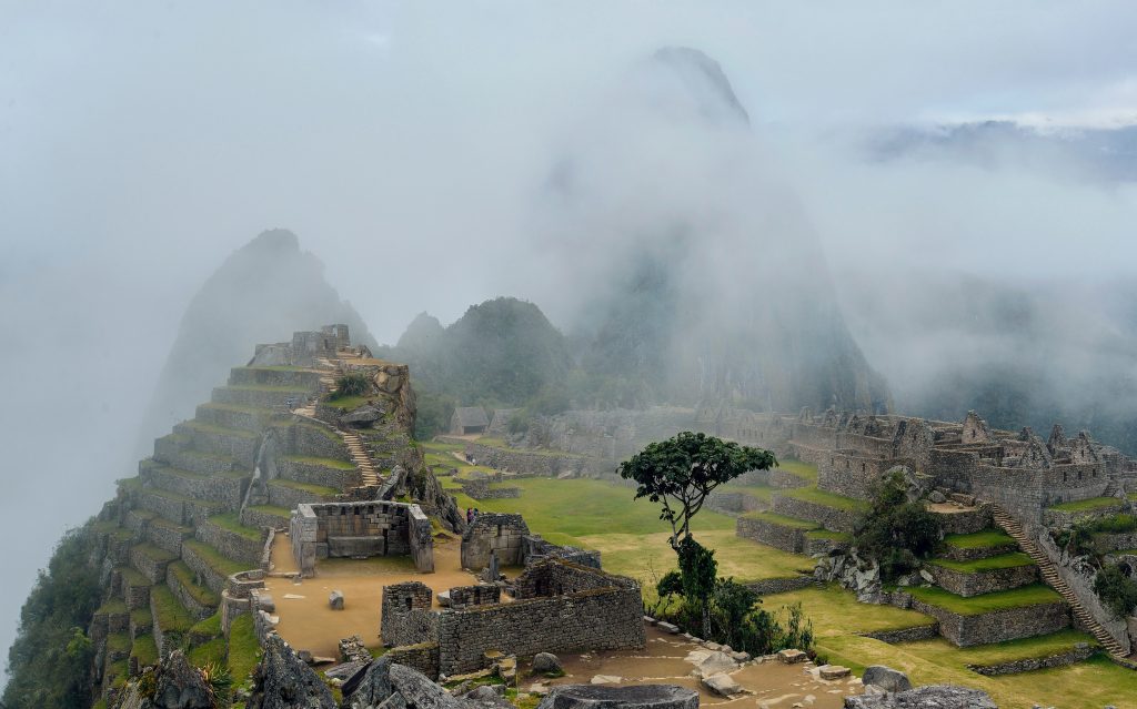 cloudy machu picchu - incan empire - bamba travel