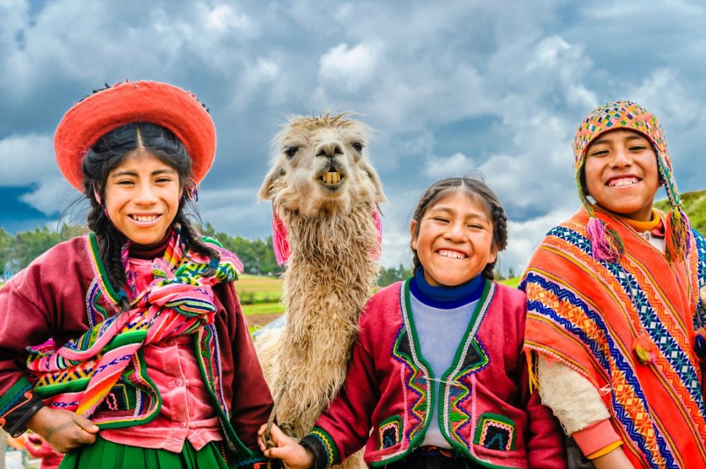 quechua people smiling - bamba travel
