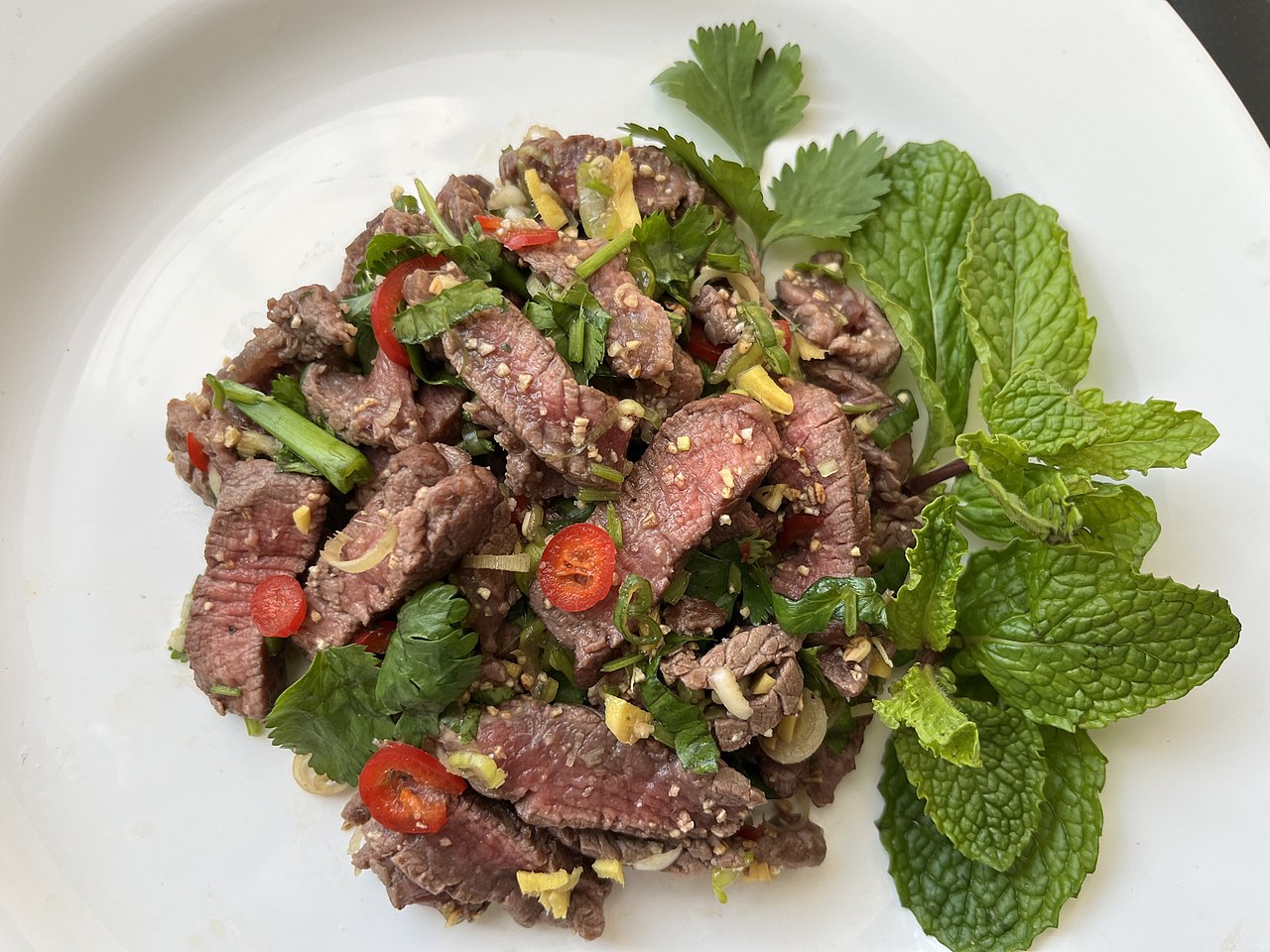 You are currently viewing A Culinary Adventure in Laos: 7 Traditional Dishes You Must Try