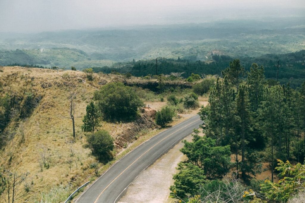 road in the middle of the field in el valle de anton in panama