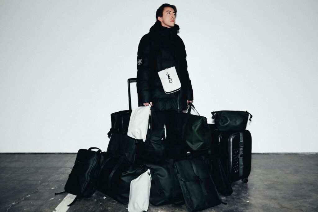 man with a lot of luggage